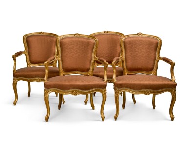 View full screen - View 1 of Lot 81. A set of four Louis XV carved giltwood fauteuils by François Reuze, mid-18th century.