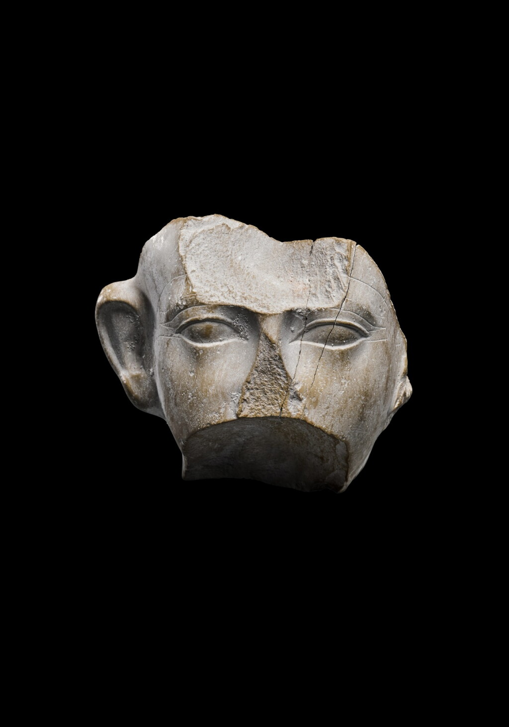 View full screen - View 1 of Lot 34. A Fragmentary Egyptian Indurated Limestone Head of Amenemhat III, 12th Dynasty, period of Amenemhat III, 1818-1772 B.C..
