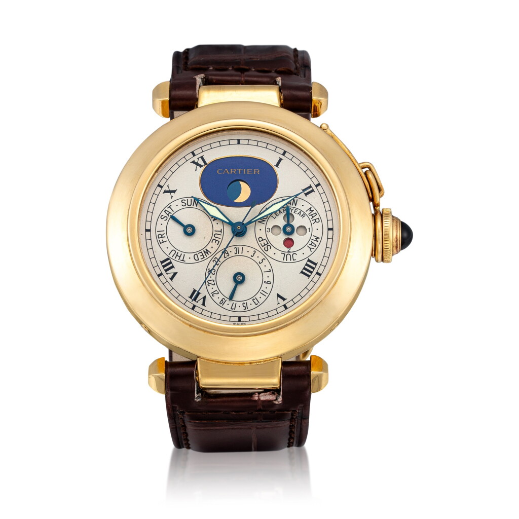 View full screen - View 1 of Lot 26. Pasha Yellow gold perpetual calendar wristwatch with moon phases and leap-year indication Circa 1995 | 卡地亞「Pasha」黃金萬年曆腕錶備月相及閏年顯示,年份約1995.