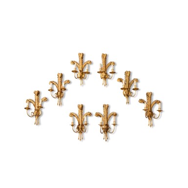 View full screen - View 1 of Lot 75. A set of eight carved giltwood two-light wall-appliques, 19th century | Ensemble de huit appliques à deux lumières en bois doré, XIXe siècle .