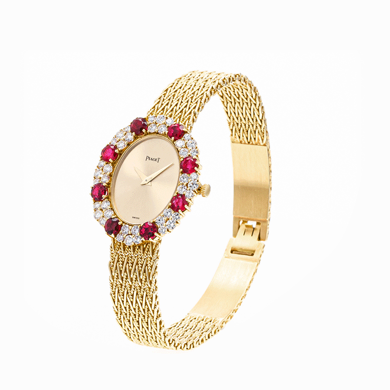 View full screen - View 1 of Lot 376. Piaget | Montre bracelet de dame rubis et diamants | Lady's ruby and diamond bracelet watch.