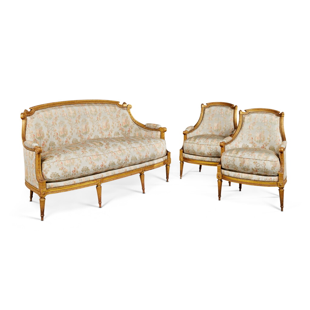 View full screen - View 1 of Lot 65. A Pair of Louis XVI Gilt Lacquered Bergères en Cabriolet with a Canapé en suite, Stamped A.P. Dupain V.F., Last Quarter 18th Century.