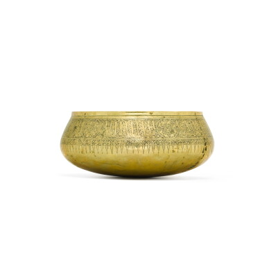 View full screen - View 1 of Lot 110. A silver-inlaid Mamluk brass basin, Egypt or Syria, early 14th century.