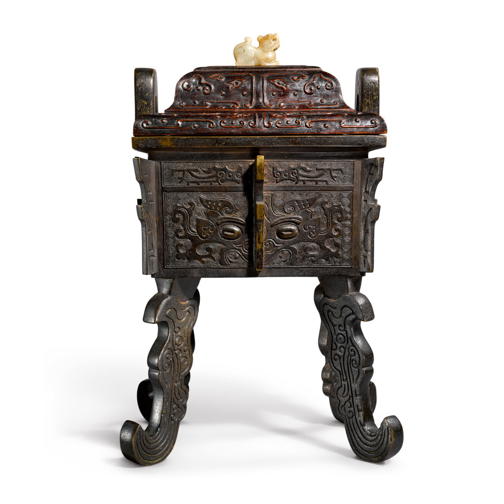 View full screen - View 1 of Lot 922. AN ARCHAISTIC BRONZE FANGDING, QING DYNASTY, 18TH / 19TH CENTURY.