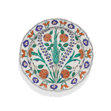 View full screen - View 1 of Lot 134. An Iznik polychrome pottery dish with cypress tree, Turkey, circa 1570.