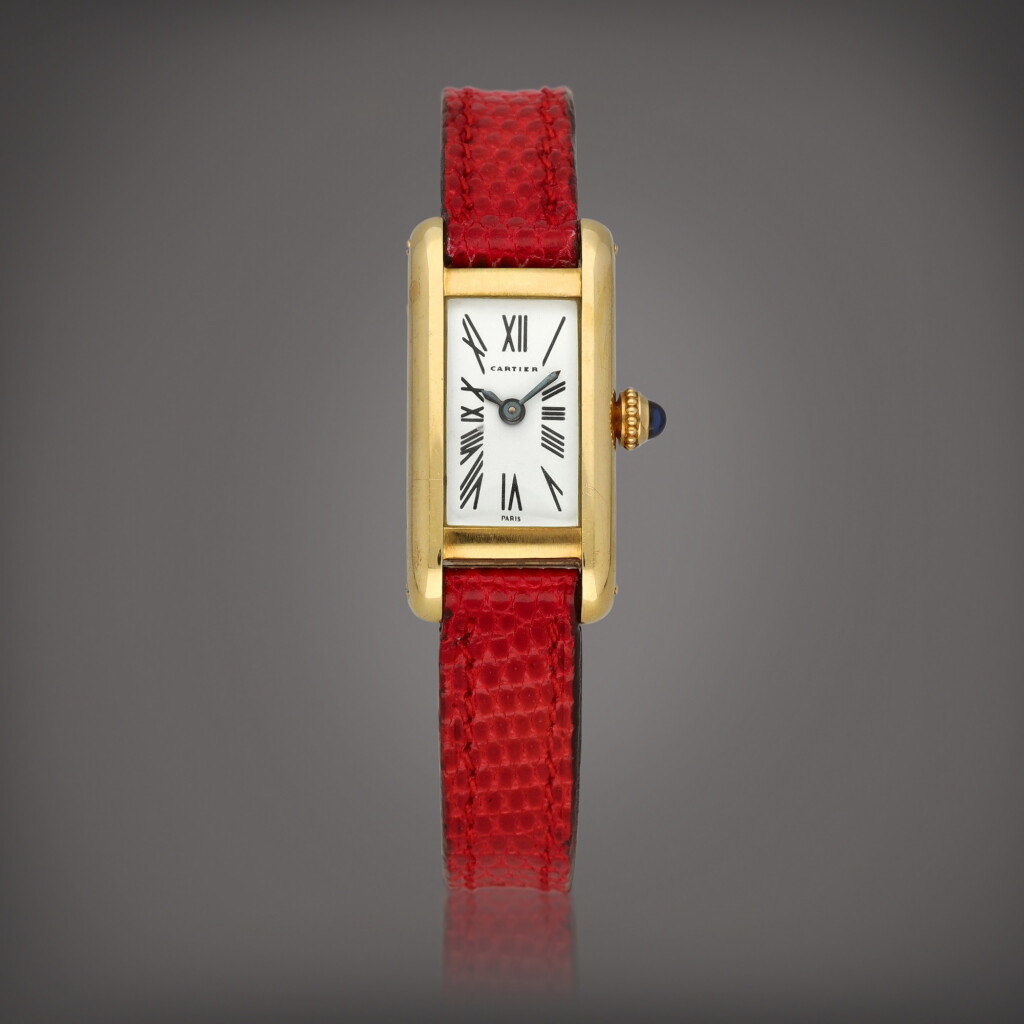 View full screen - View 1 of Lot 59. Mini Tank Américaine | A yellow gold wristwatch | Circa 1990.