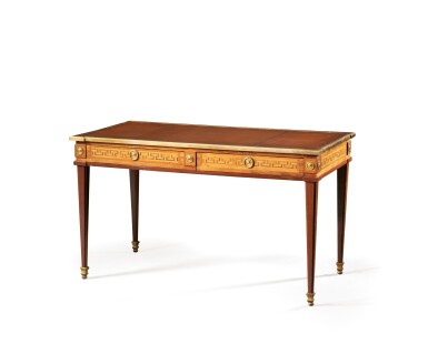 View full screen - View 1 of Lot 108. A partly Louis XVI regilt-bronze mounted amaranth, tulipwood, tinted hornbeam veneered bureau plat, in the manner of Philippe-Claude Montigny.