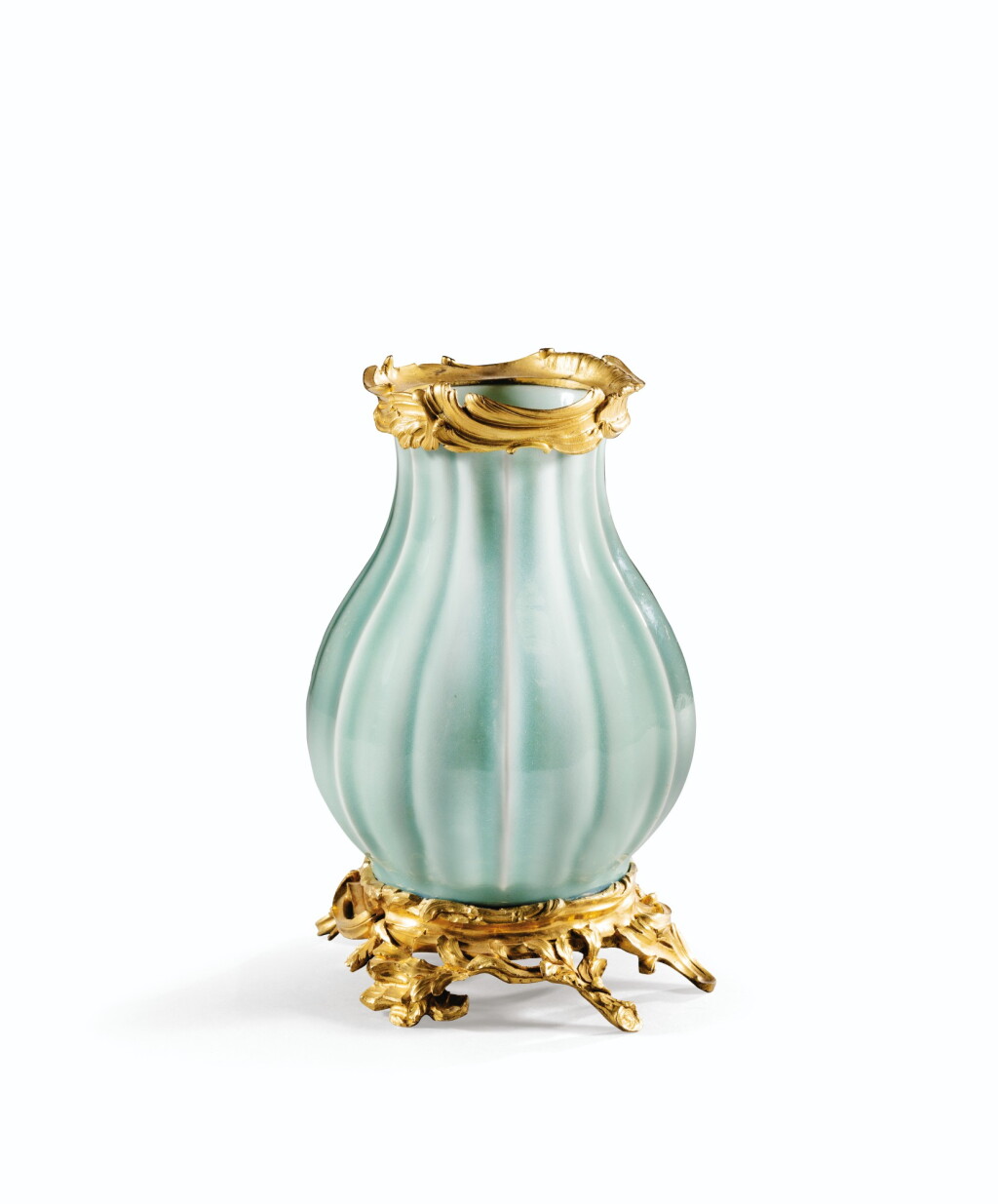 View full screen - View 1 of Lot 49. A LOUIS XV GILT-BRONZE MOUNTED CHINESE PORCELAIN CELADON VASE | VASE BALUSTRE À CÔTES EN PORCELAINE DE CHINE CÉLADON ET MONTURE DE BRONZE DORÉ D'ÉPOQUE LOUIS XV.