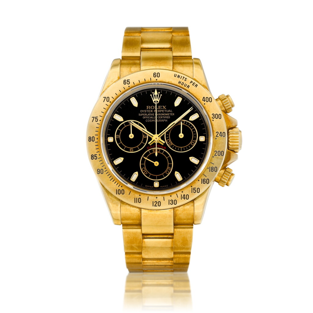 View full screen - View 1 of Lot 2106. Cosmograph Daytona, Reference 116528 | A yellow gold chronograph wristwatch with bracelet, Circa 2002 | 勞力士 | Cosmograph Daytona 型號116528 | 黃金計時鏈帶腕錶,約2002年製.