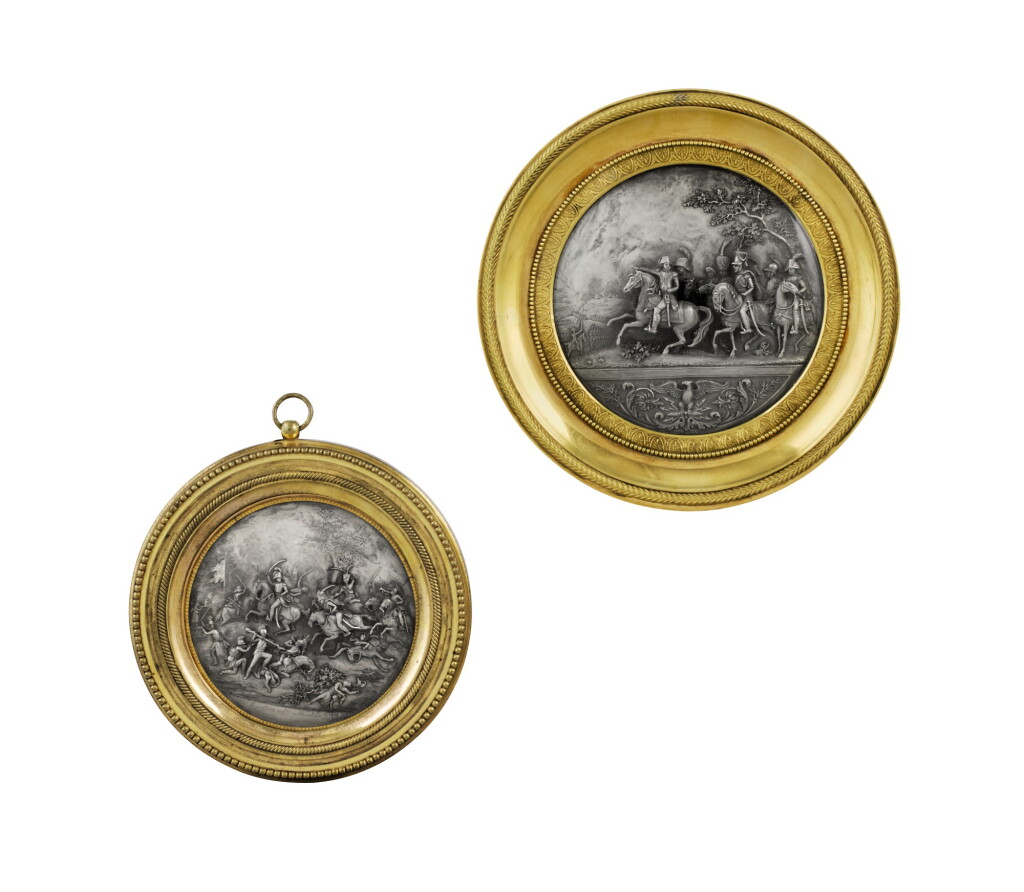 View full screen - View 1 of Lot 38. A SET OF TWO REPOUSSÉ AND CHISELLED SILVER MEDALLIONS, JACQUES-FRÉDÉRIC KIRSTEIN, STRASBOURG, CIRCA 1810, ONE DATED 1809 | ENSEMBLE DE DEUX MÉDAILLONS EN ARGENT REPOUSSÉ ET CISELÉ, PAR JACQUES-FRÉDÉRIC KIRSTEIN, STRASBOURG, VERS 1810, L'UN DATÉ 1809.