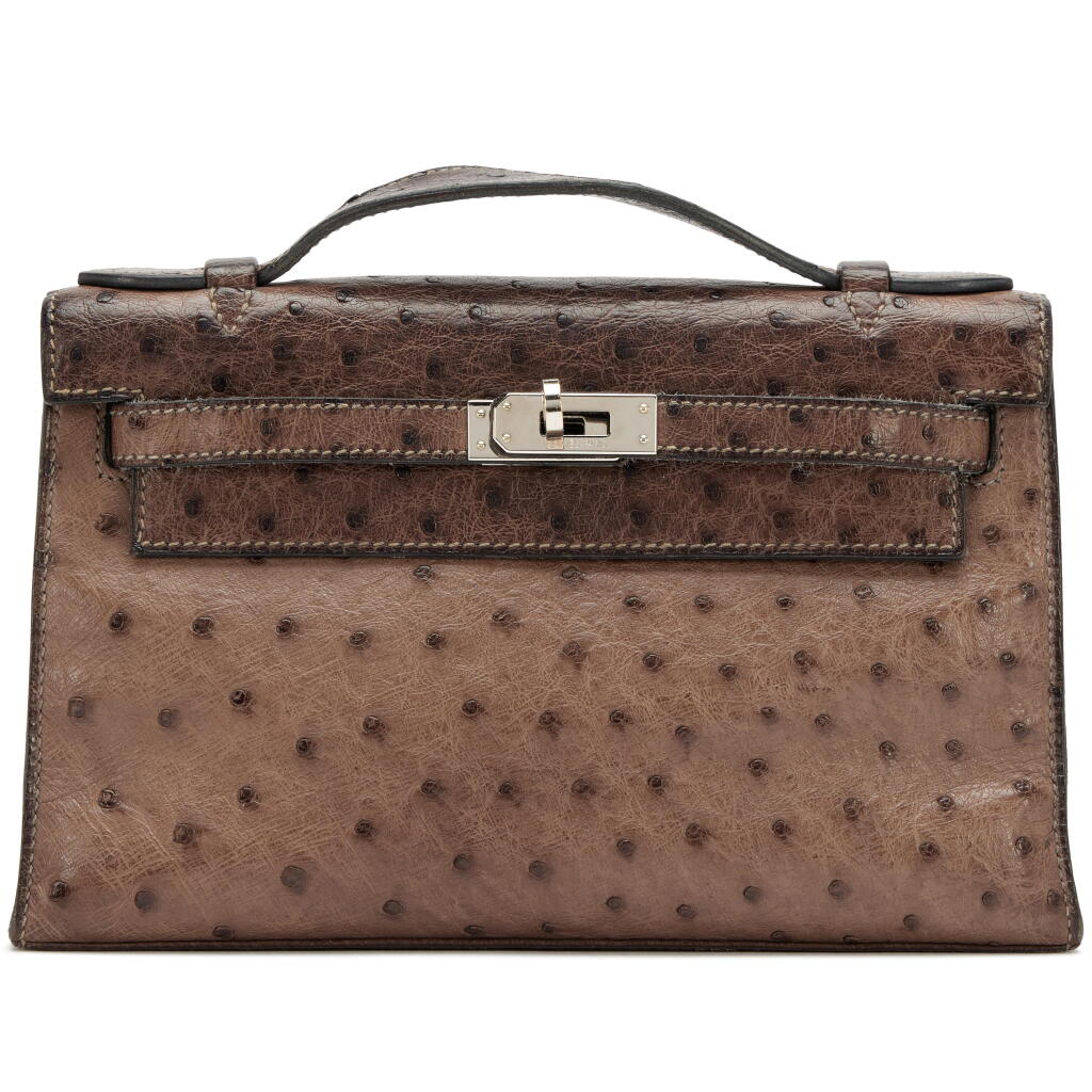 View full screen - View 1 of Lot 123. Gris Tourterelle Ostrich Kelly Pochette Palladium Hardware, 2009 .