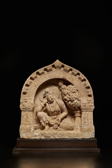 View full screen - View 1 of Lot 557. A rare stucco niche with a pensive bodhisattva, Ancient Region of Gandhara, 4th / 5th century.