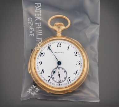 View full screen - View 1 of Lot 34. Retailed by Tiffany & Co.: A yellow gold open faced five minute repeating watch, Service Sealed, Made in 1903 | 零售商為蒂芙尼:百達翡麗 黃金五分問懷錶,附原廠保養封套,製作年份 1903.