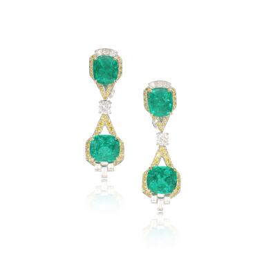 View full screen - View 1 of Lot 587. Elegant pair of emerald and diamond pendent earrings.