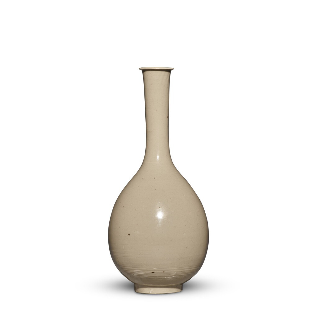 View full screen - View 1 of Lot 94. A rare 'Ding' bottle vase, Jin dynasty | 金 定窰白釉長頸瓶.