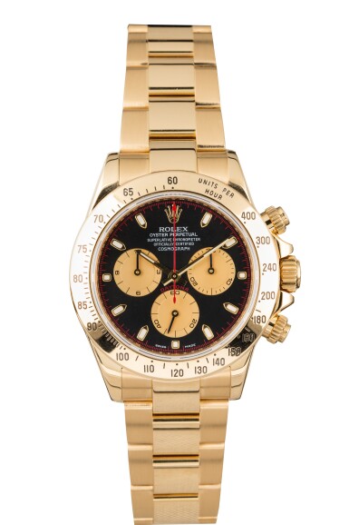 View full screen - View 1 of Lot 9. ROLEX | Daytona, Ref 116528 A Yellow Gold Chronograph Wristwatch with Bracelet Circa 2001.