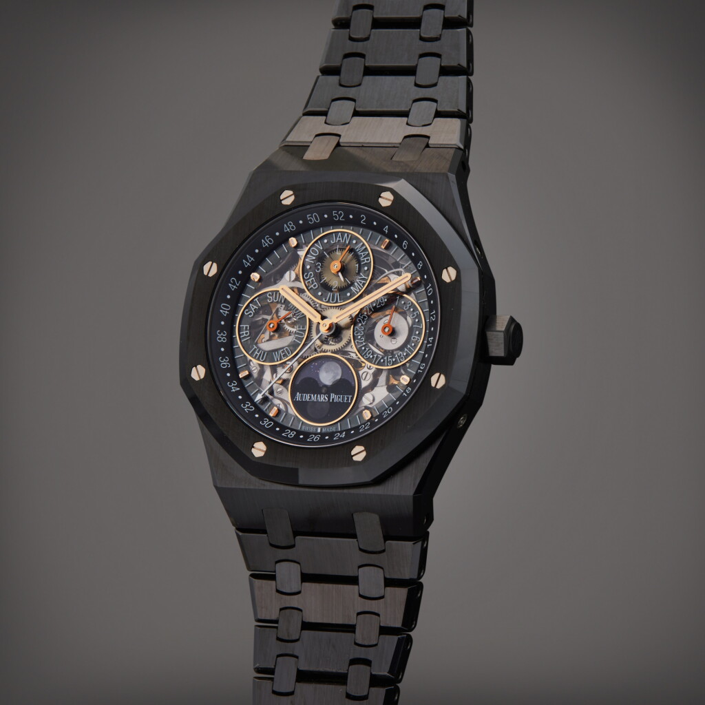 View full screen - View 1 of Lot 101. Reference 26585CE.OO.1225CE.01 Royal Oak Perpetual Calendar Openworked | A ceramic skeletonized automatic perpetual calendar wristwatch with moon phases and bracelet, Circa 2019 | 愛彼 型號 26585CE.OO.1225CE.01 Royal Oak Perpetual Calendar Openworked 陶瓷鏤空自動上鏈萬年曆鍊帶腕錶備月相顯示,製作年份約 2019.