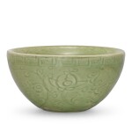 A LONGQUAN CELADON CARVED WARMING BOWL EARLY MING DYNASTY | 明初 龍泉青釉刻花卉紋溫盌