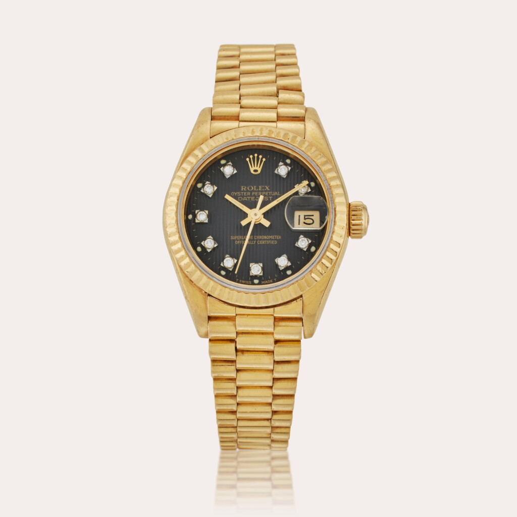 View full screen - View 1 of Lot 656. Reference 69178 Datejust | A yellow gold and diamond-set automatic wristwatch with date and bracelet, Circa 1989.