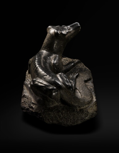View full screen - View 1 of Lot 9803. A unique and large inscribed black limestone sculpture of a hound, Tang - Song dynasty, 8th - 12th century | 唐至宋 八至十二世紀 黑石灰岩臥犬.
