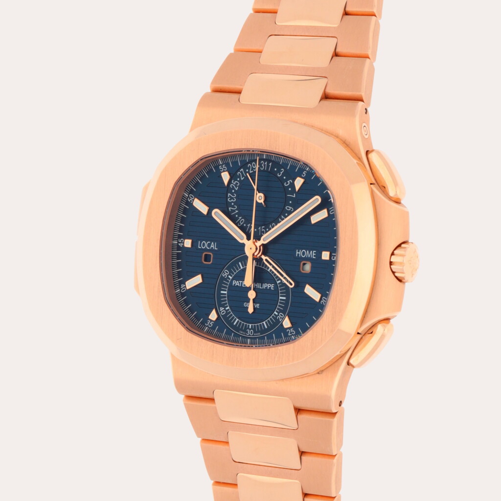 View full screen - View 1 of Lot 66. Nautilus Travel Time Chronograph, Reference 5990/1R-001 | A pink gold dual time zone flyback chronograph wristwatch with date, dual day/night indication and bracelet | Circa 2022.