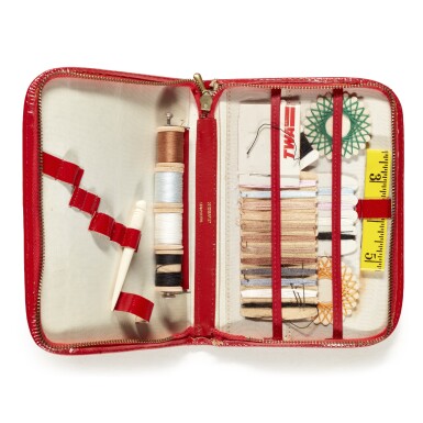 View full screen - View 1 of Lot 1799. A vintage sewing kit, pin-cushion and three thimbles.