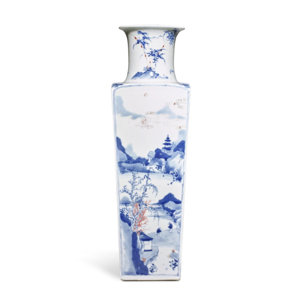 View full screen - View 1 of Lot 391. A copper-red and underglaze-blue 'landscape' quadrangular vase, Qing dynasty, Kangxi period | 清康熙 青花釉裏紅山水人物圖方瓶.