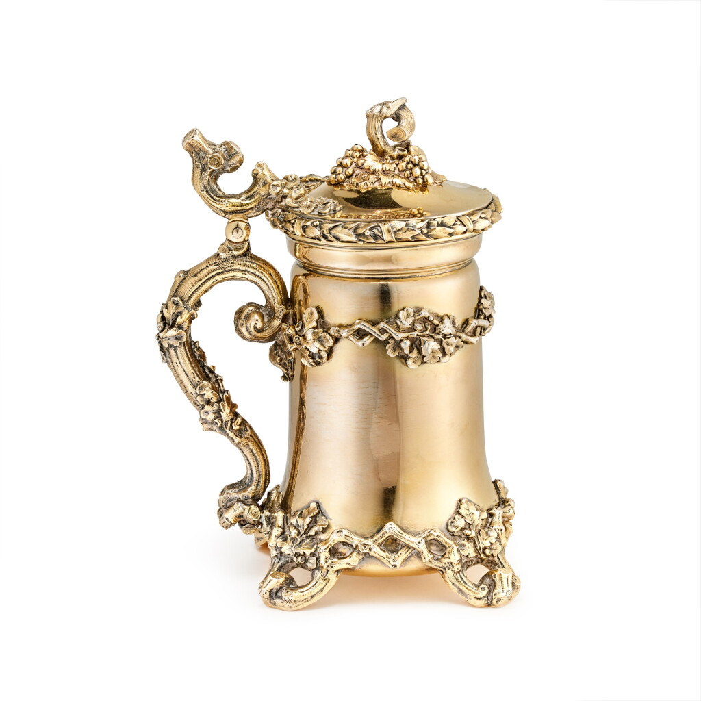 View full screen - View 1 of Lot 354. A figural silver-gilt tankard, Nichols and Plinke, St Petersburg, 1866.