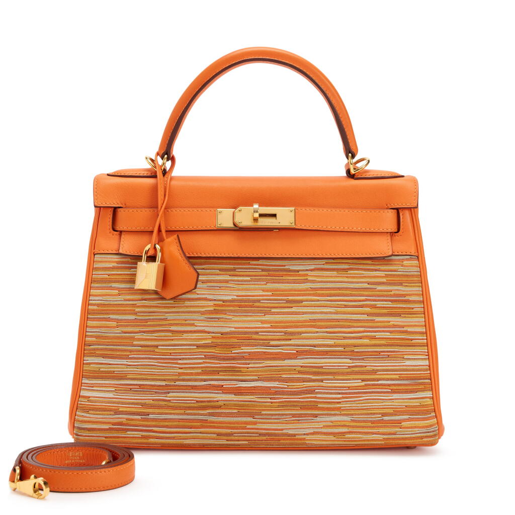 View full screen - View 1 of Lot 43. Limited Edition Orange H Evercalf Vibrato Kelly 28 Retourne Gold Hardware, 2010.
