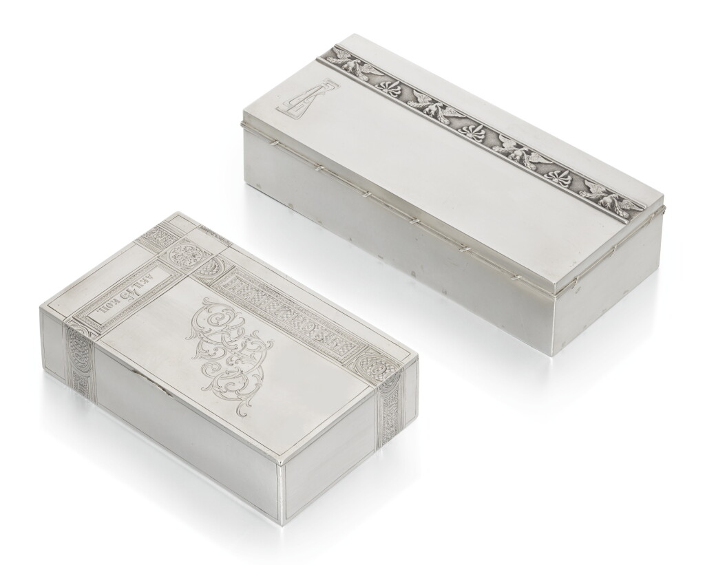 View full screen - View 1 of Lot 436. Two silver trompe l-oeil cigar boxes, one St Petersburg, 1904-1908; the other First Kiev Silver Artel, Kiev, 1908-1917.