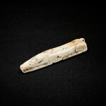 A calcified celadon jade pig, Eastern Han - Jin dynasty 東漢至晉 青玉豬握
