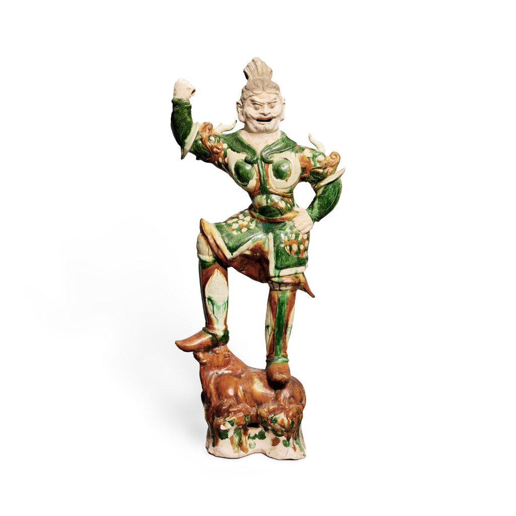 View full screen - View 1 of Lot 68. A sancai-glazed pottery figure of a Lokapala, Tang dynasty | 唐 三彩天王立像.