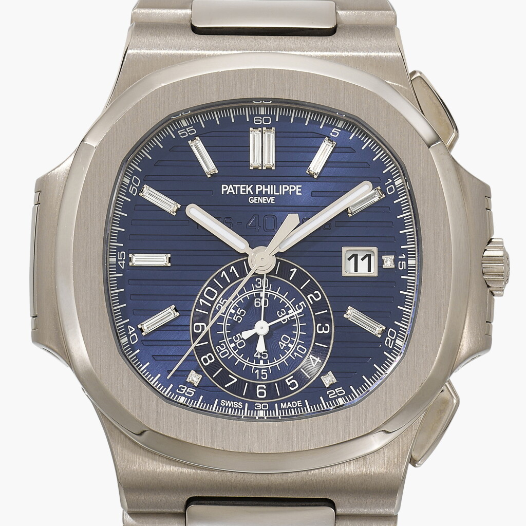 View full screen - View 1 of Lot 151. Nautilus '40th Anniversary', Reference 5976/1G-001 | A limited edition white gold and diamond-set flyback chronograph wristwatch with date and bracelet | Circa 2017.