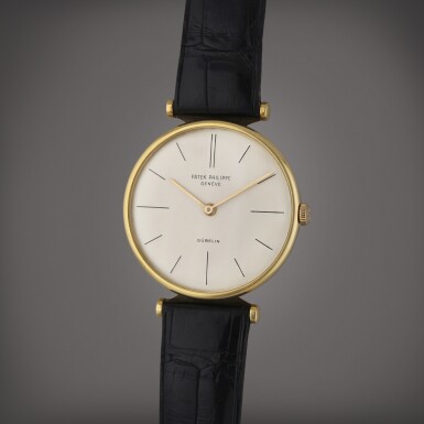 View full screen - View 1 of Lot 545. Reference 2592 | Retailed by Gübelin: A yellow gold wristwatch, Circa 1961.