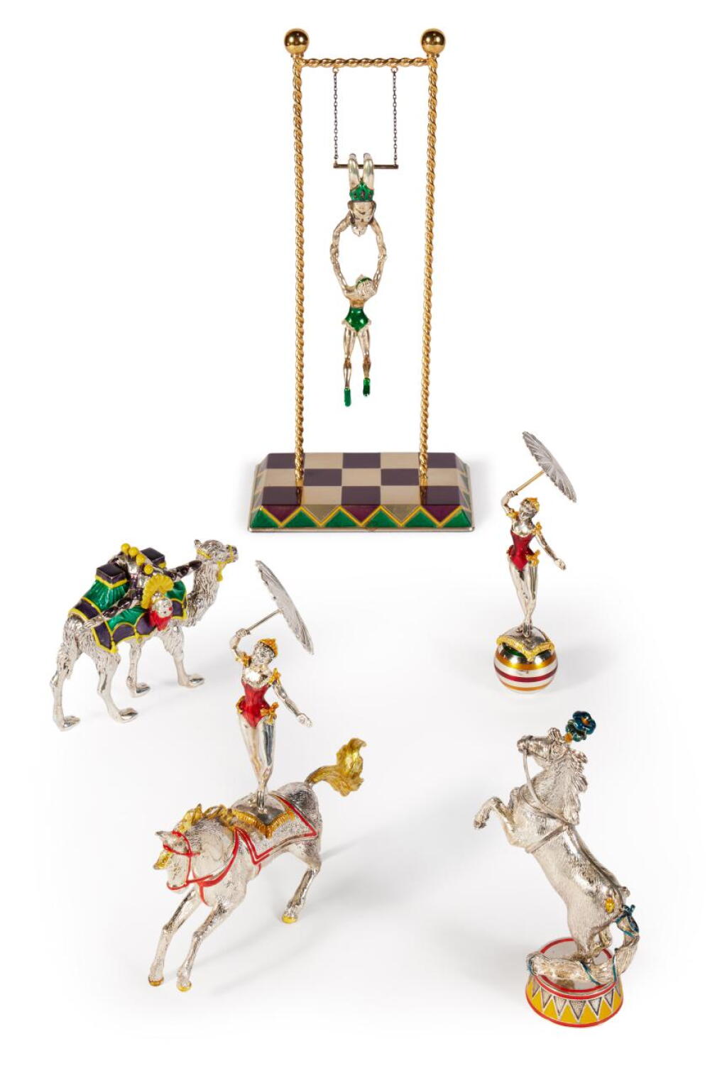 View full screen - View 1 of Lot 181. A Group of Silver and Enamel Circus Figures, Designed by Gene Moore for Tiffany & Co., New York, Circa 1990.