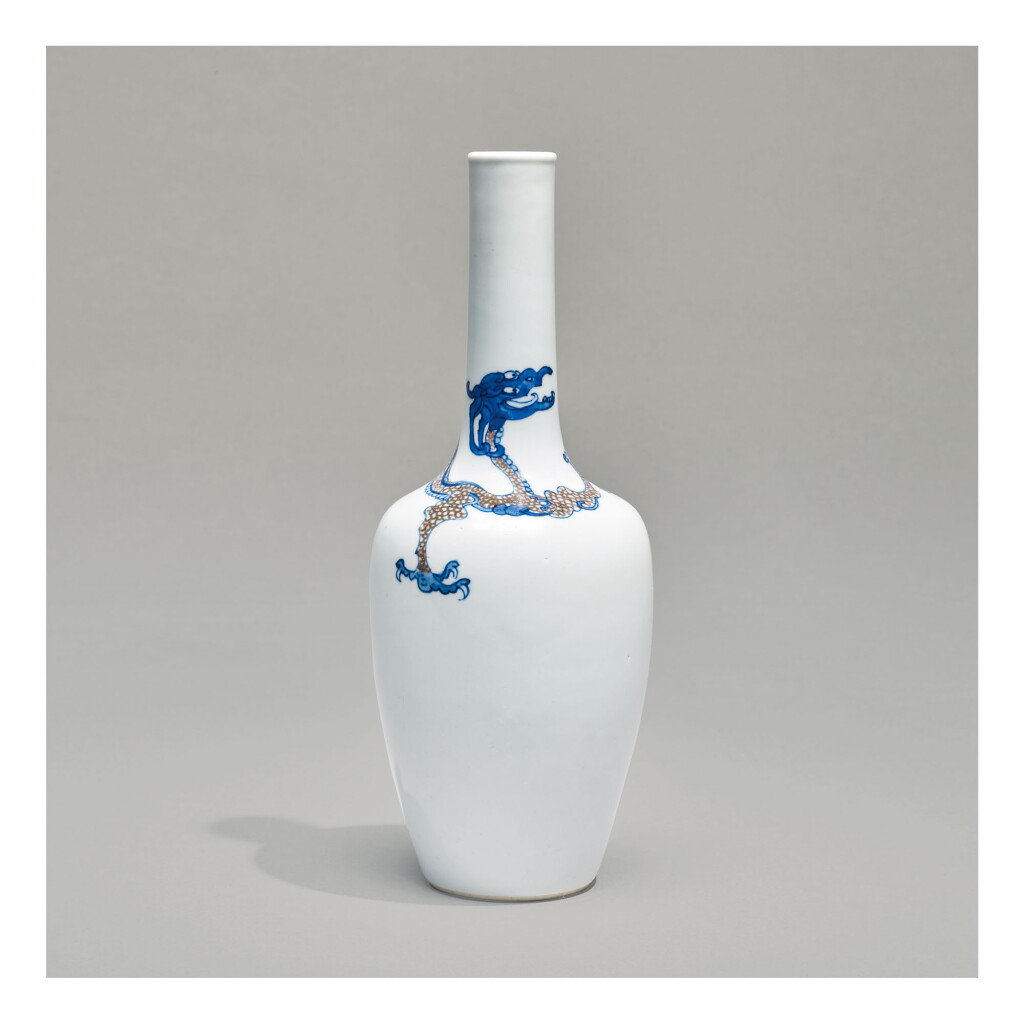View full screen - View 1 of Lot 109. A RARE UNDERGLAZE-BLUE AND COPPER-RED 'DRAGON' BOTTLE VASE, KANGXI MARK AND PERIOD.
