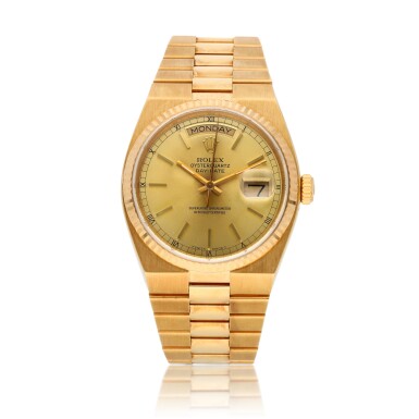 View full screen - View 1 of Lot 12. Oysterquartz Day-Date, Ref 19018 Yellow gold wristwatch with day, date and bracelet Circa 1986.