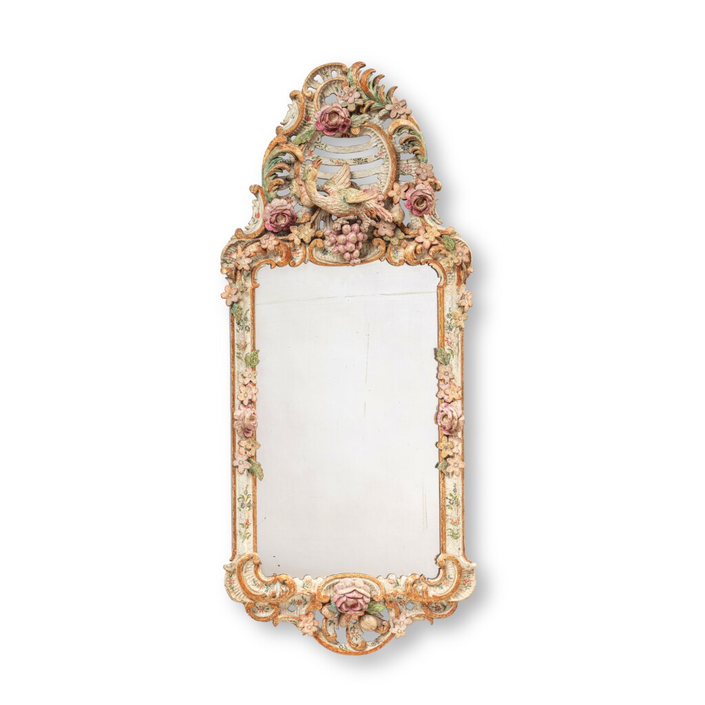 View full screen - View 1 of Lot 537. A South German carved polychrome-painted mirror, probably Bayreuth, circa 1750-1760 .