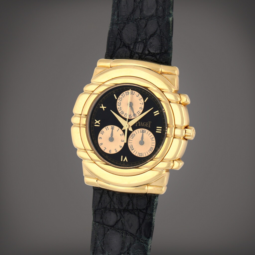 View full screen - View 1 of Lot 355. Reference 14081| A yellow gold chronograph wristwatch with date | Circa 1995.