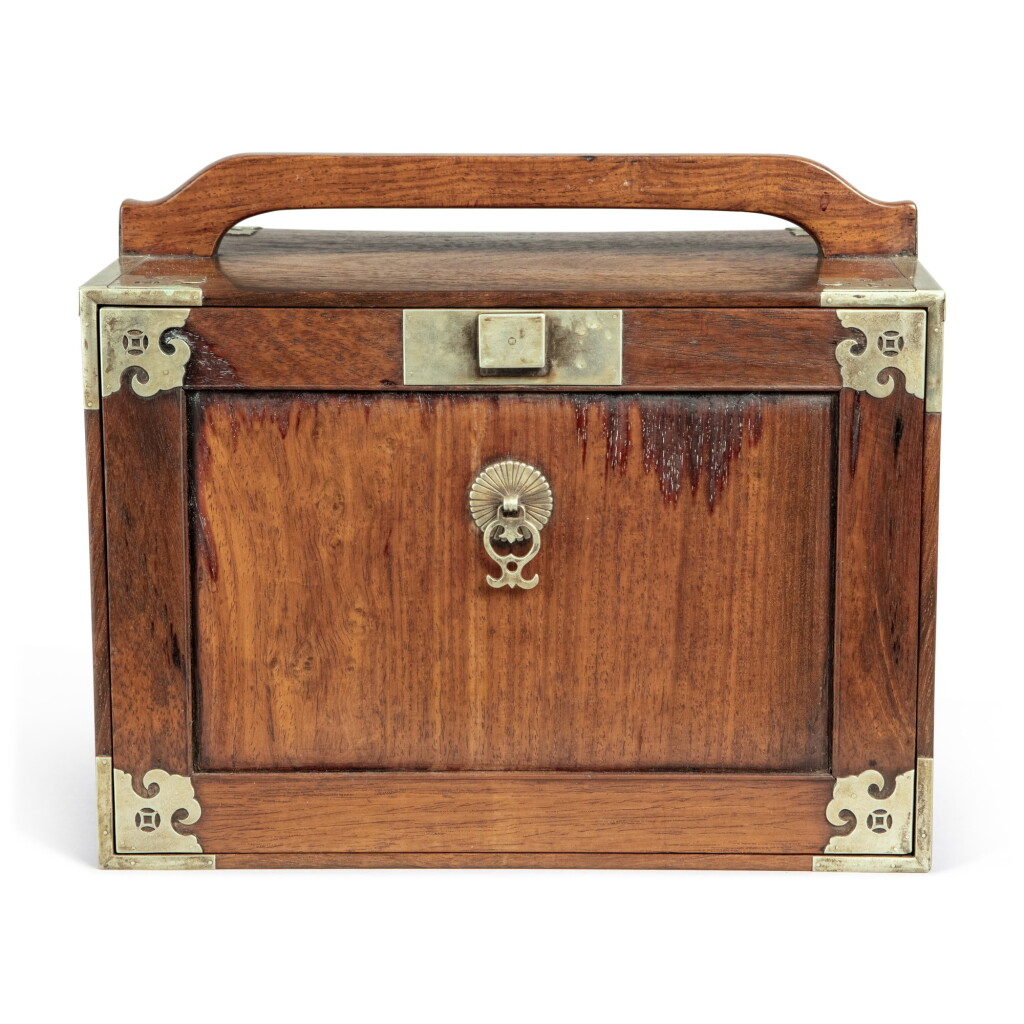 View full screen - View 1 of Lot 117. A small 'huanghuali' portable cabinet (Yaoxiang), Qing dynasty, 18th / 19th century | 清十八 / 十九世紀 黃花梨插門式藥箱.