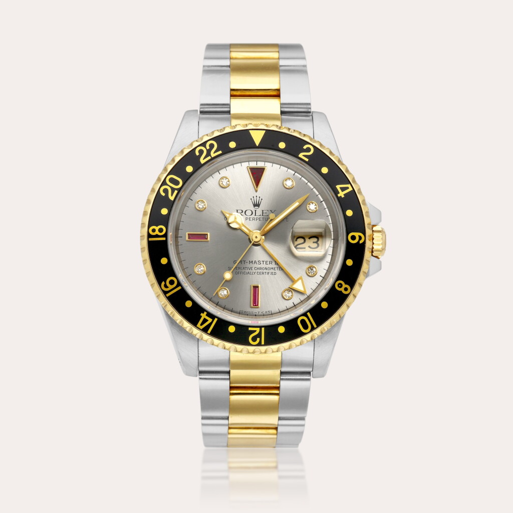 View full screen - View 1 of Lot 2215. GMT-Master II "Serti", Reference 16713 | A yellow gold, stainless steel, diamond and ruby-set dual time zone wristwatch with date and bracelet, Circa 1990.