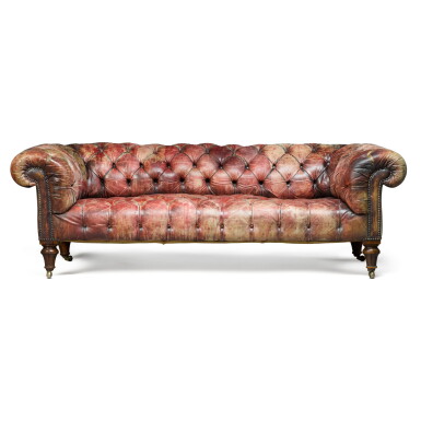 View full screen - View 1 of Lot 72. A late Victorian leather upholstered walnut Chesterfield sofa, late 19th century.