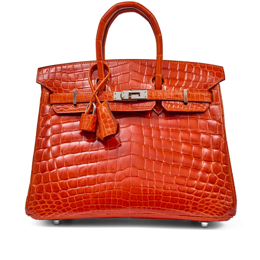 View full screen - View 1 of Lot 22. Orange Shiny Niloticus Crocodile Birkin 25 Palladium Hardware, 2009.