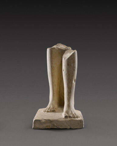View full screen - View 1 of Lot 143. An Egyptian Limestone Statue Fragment, 30th Dynasty/Ptolemaic Period, 380-30 B.C..
