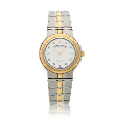 View full screen - View 1 of Lot 88. Reference 12020 Phidias, A stainless steel and yellow gold automatic bracelet watch with diamond-set indexes, Circa 1990.