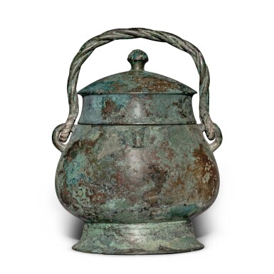 View full screen - View 1 of Lot 620. An important inscribed archaic bronze ritual wine vessel (You), Late Shang dynasty | 商末 青銅獸面紋卣.