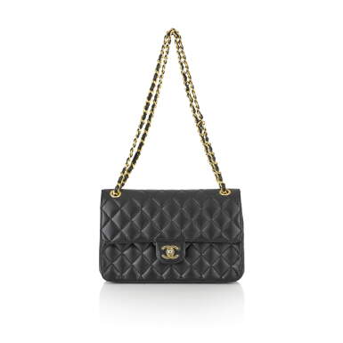 View full screen - View 1 of Lot 137. CHANEL | VINTAGE 2.55 FLAP BAG BLACK LAMBSKIN WITH GOLD HARDWARE, CIRCA 1970.