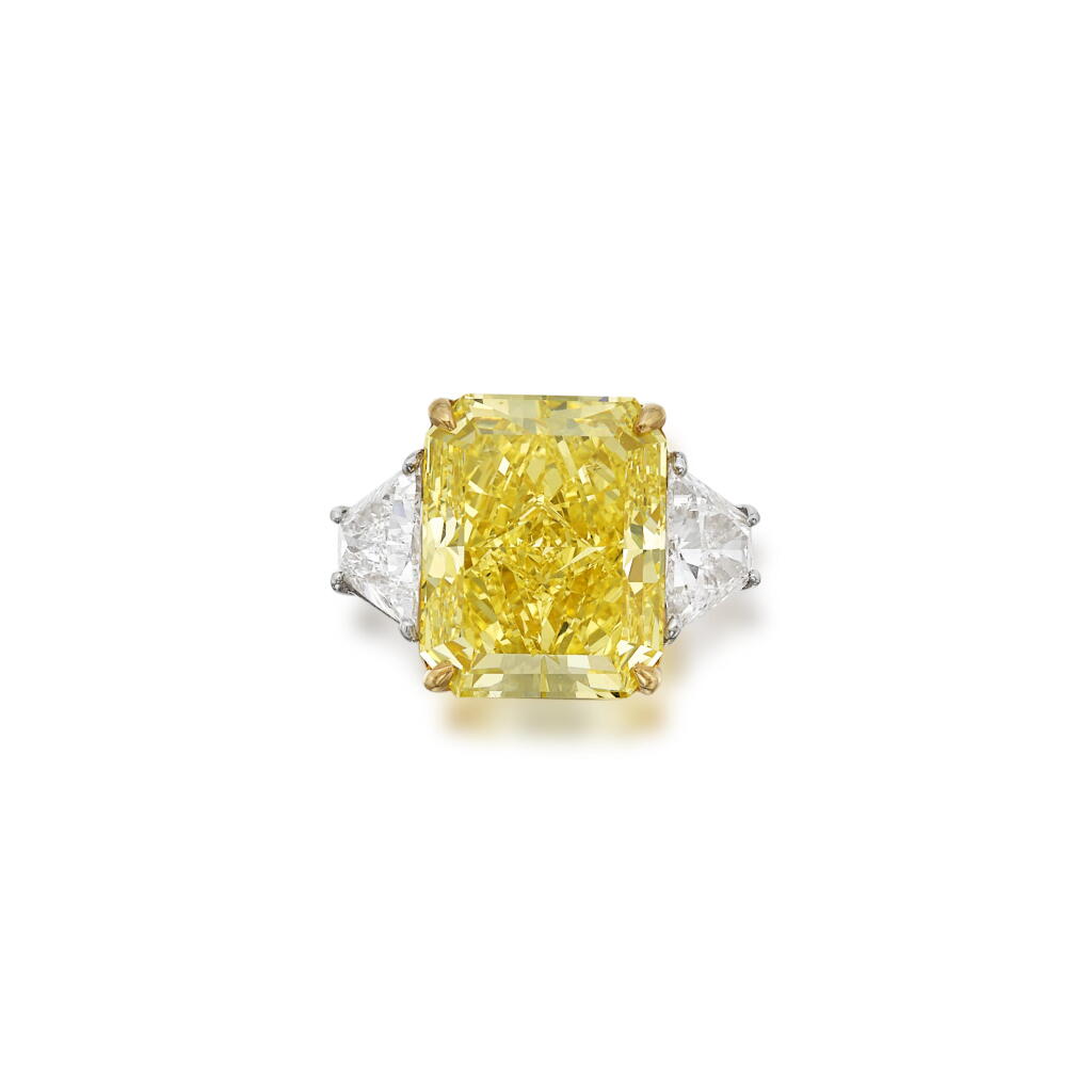 View full screen - View 1 of Lot 600. Fancy Intense Yellow diamond ring.