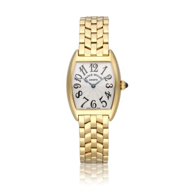 View full screen - View 1 of Lot 338. Reference 2250 QZ | A yellow gold tonneau shaped bracelet watch, Circa 2000.