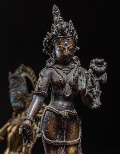 View full screen - View 1 of Lot 32. A bronze figure of Padmapani and a bronze figure of Indra, Nepal, 19th century.